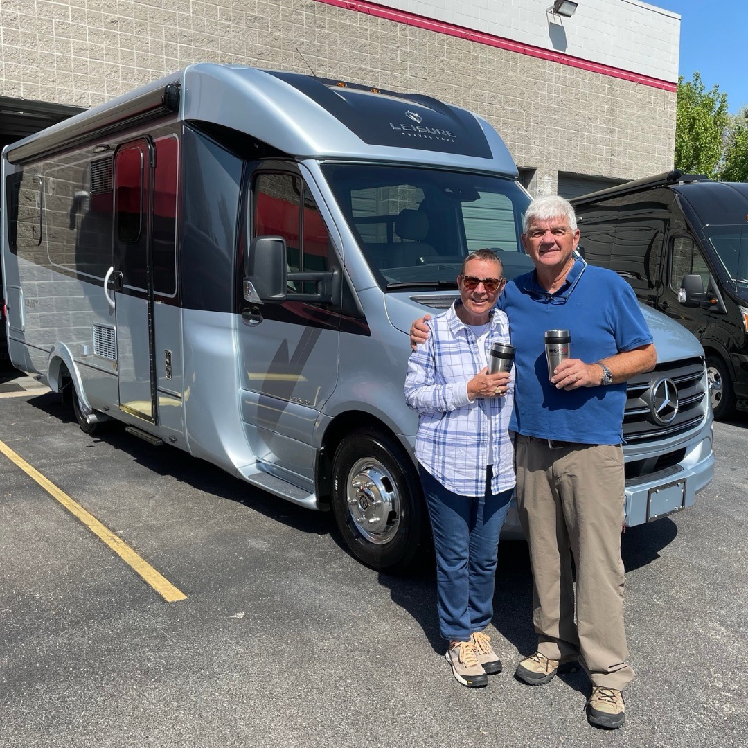 Van City RV customer taking delivery of their Leisure Travel Van